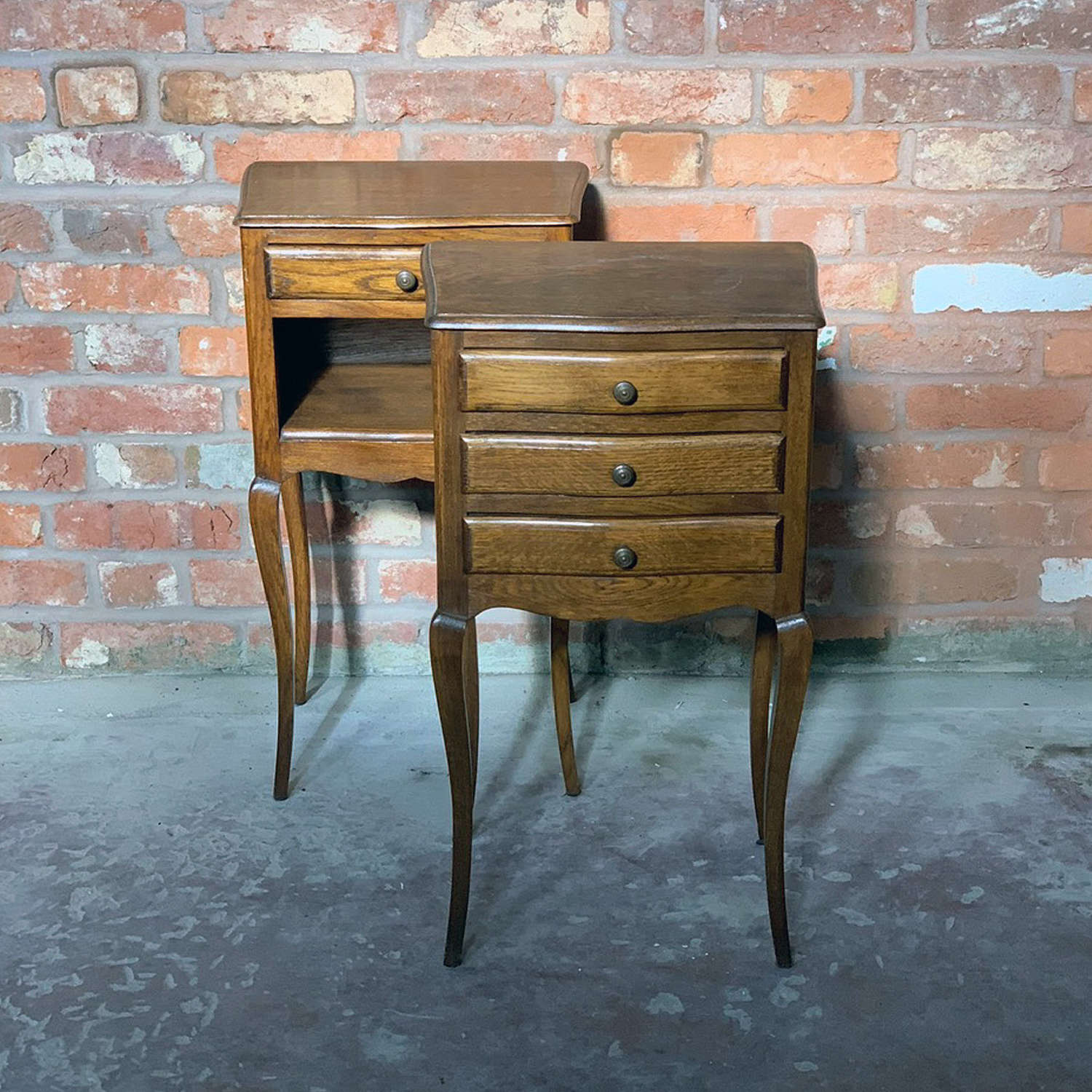 A petite pair of French Mid 20th Century oak bedside tables