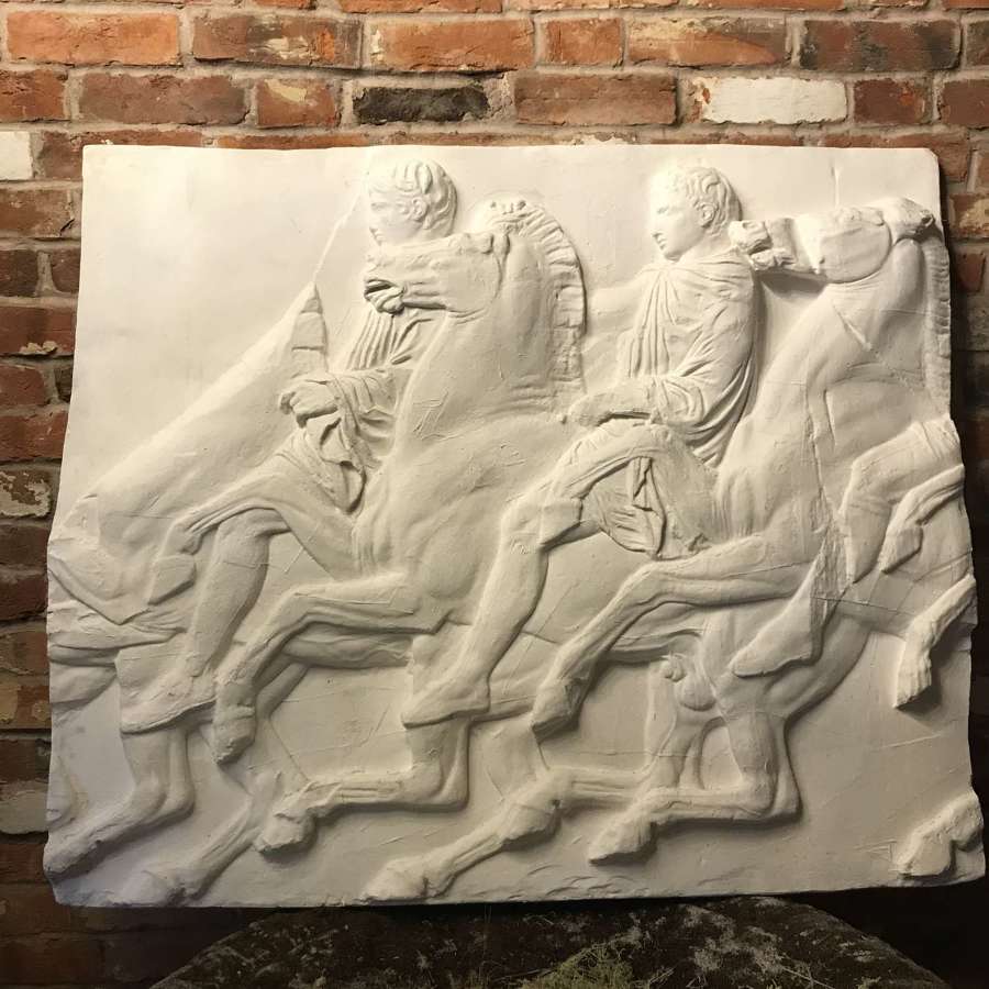 A plaster Panel of a section of the Parthenon Frieze