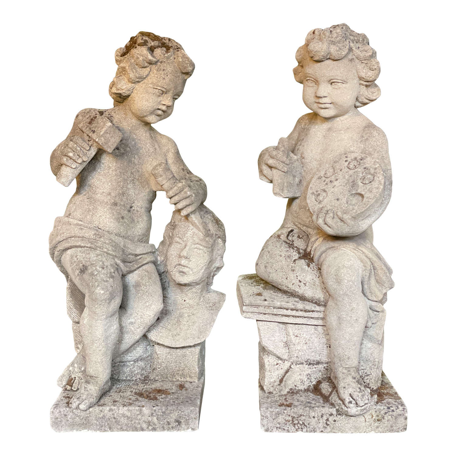 A pair of 20th century carved stone Putti.